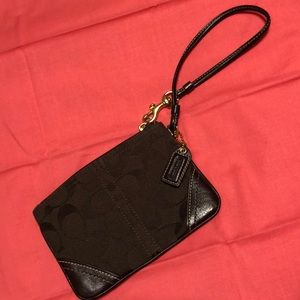 Dark brown coach wristlet